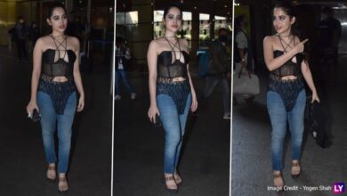Urfi Javed Pairs a Black Mesh Bodycon Top With Blue Denims for Her Bizarre Airport Arrival (View Pics)