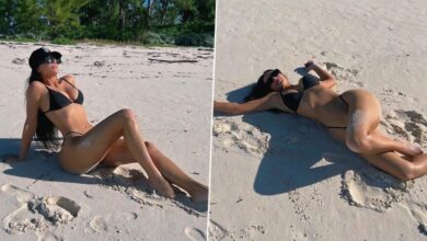 Kim Kardashian Is a Bombshell in Black Bikini As She Plays Around in the Sun and Sand (View Pics)
